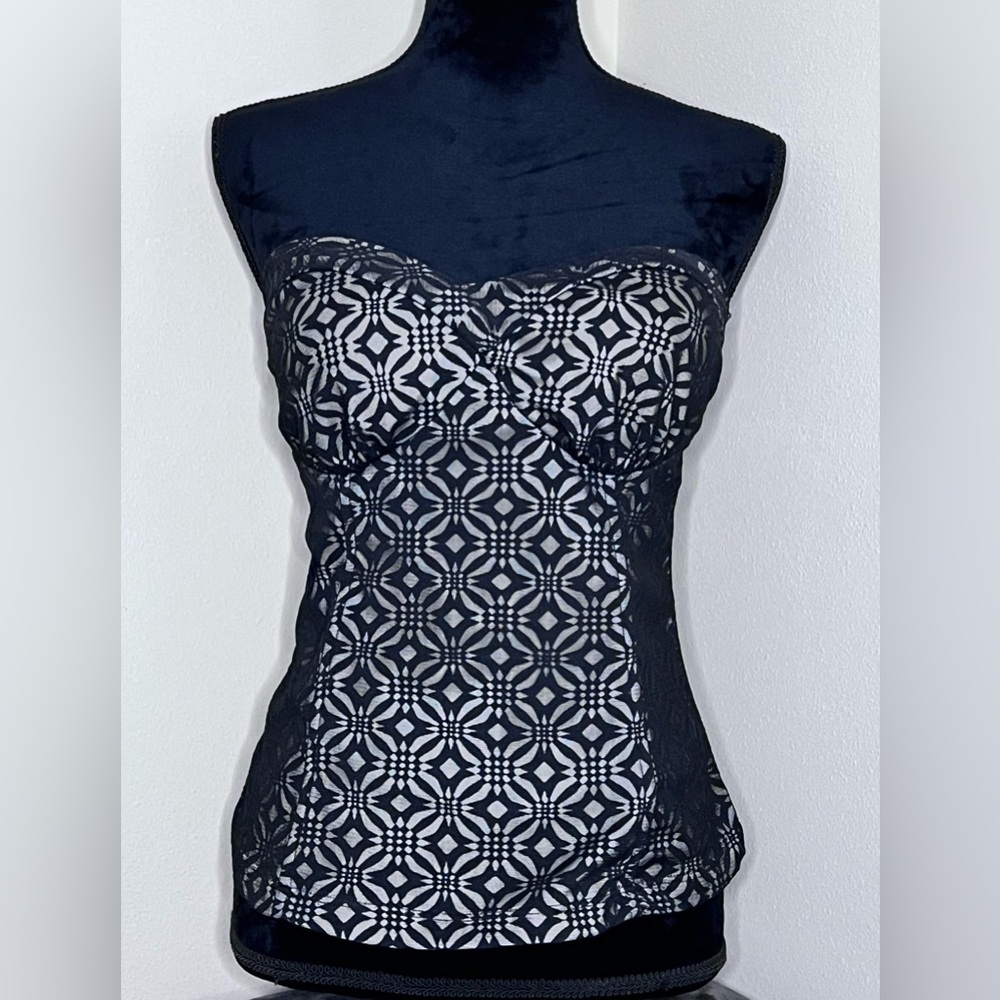 Charlotte Russe strapless, corset-like, top. Size Med. Black/cream lace pattern